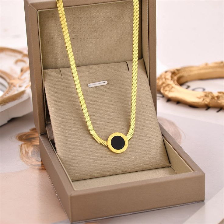 Gold and Black Coin-Style Necklace